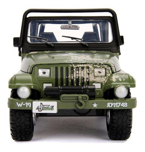 Jeep Wrangler 1992 Verde C/ Jogo Rodas Extras Jada 1/24 Imagem de Jeep Wrangler 1992 Verde C/ Jogo Rodas Extras Jada 1/24