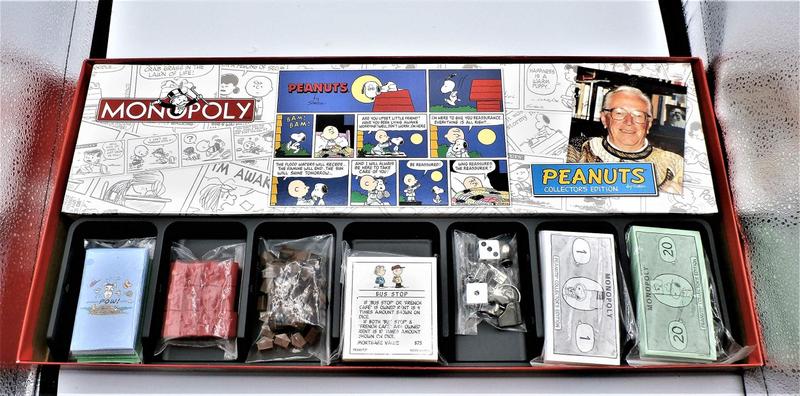 Imagem de Jogo de tabuleiro USAOPOLY Peanuts Monopoly com fichas colecionáveis