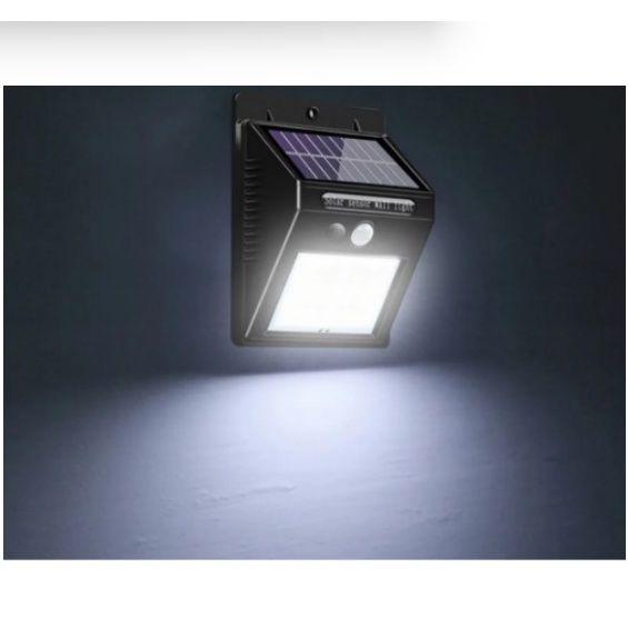 KIT 4 Luminaria Refletor Arandela Com Painel Solar 20 Led's Com Sensor De Movimento Prova D' Água Imagem de KIT 4 Luminaria Refletor Arandela Com Painel Solar 20 Led's Com Sensor De Movimento Prova D' Água