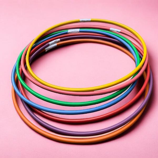 Kit Com 15 Bambolês Argola Reforçado Cores Sortidas 65 Cm - 5+ Imagem de Kit Com 15 Bambolês Argola Reforçado Cores Sortidas 65 Cm