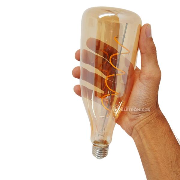 Lâmpada Formato Garrafa Retrô Com Filamento LED 4W Bivolt Ângulo de Abertura 360 Graus 61522 - Embu LED Imagem de Lâmpada Formato Garrafa Retrô Com Filamento LED 4W Bivolt Ângulo de Abertura 360 Graus 61522