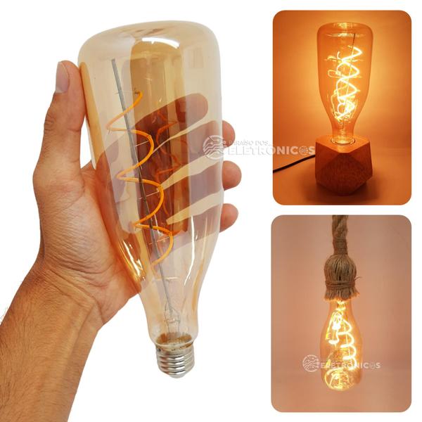 Lâmpada Formato Garrafa Retrô Com Filamento LED 4W Bivolt Ângulo de Abertura 360 Graus 61522 - Embu LED Imagem de Lâmpada Formato Garrafa Retrô Com Filamento LED 4W Bivolt Ângulo de Abertura 360 Graus 61522