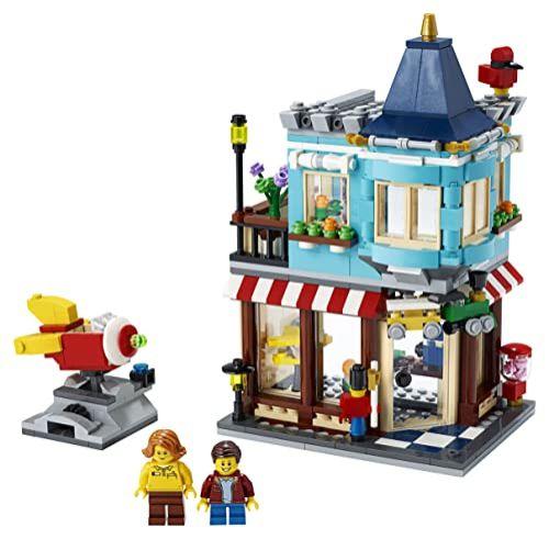 Imagem de LEGO 31105 Creator 3-in-1 Townhouse Toy Store - Cake Shop - Florist Building Set, com Flores e Working Rocket Ride, para crianças de 8 anos
