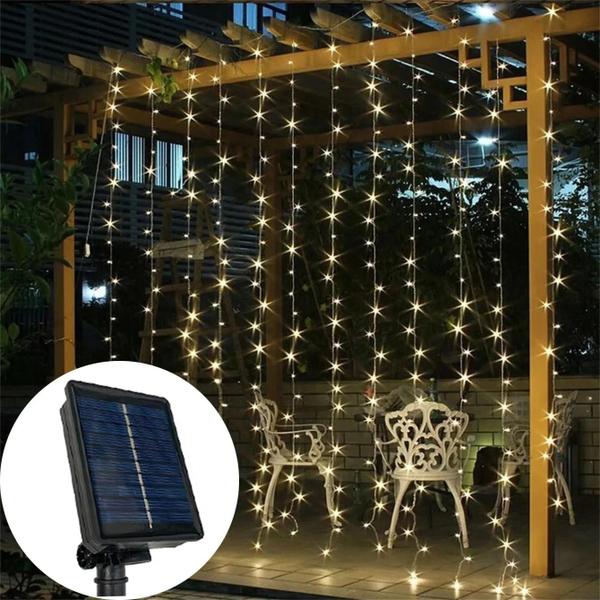 Imagem de Luzes de Cortina LED Solar com 8 Modos - Decoração para Festas e Natal