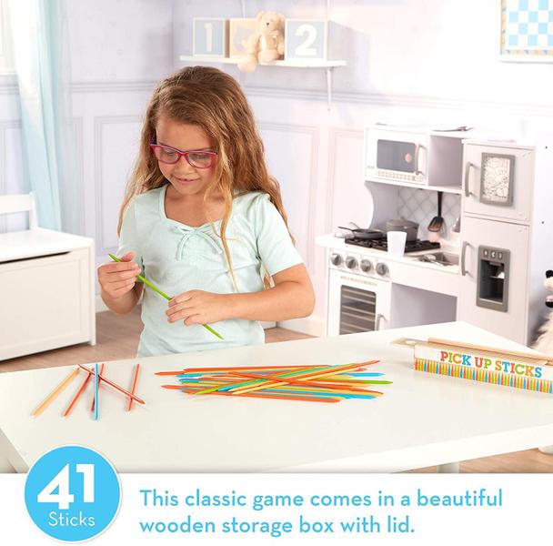 Imagem de Melissa &amp Doug Wooden Pick-Up Sticks Tabletop Game com 41 peças de madeira coloridas em caixa de armazenamento de madeira