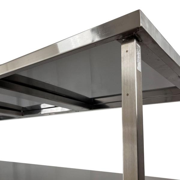 Mesa de Aço Inox Industrial 150x70x90 cm com 2 Prateleiras Plano Liso Nortinox Imagem de Mesa de Aço Inox Industrial 150x70x90 cm com 2 Prateleiras Plano Liso Nortinox
