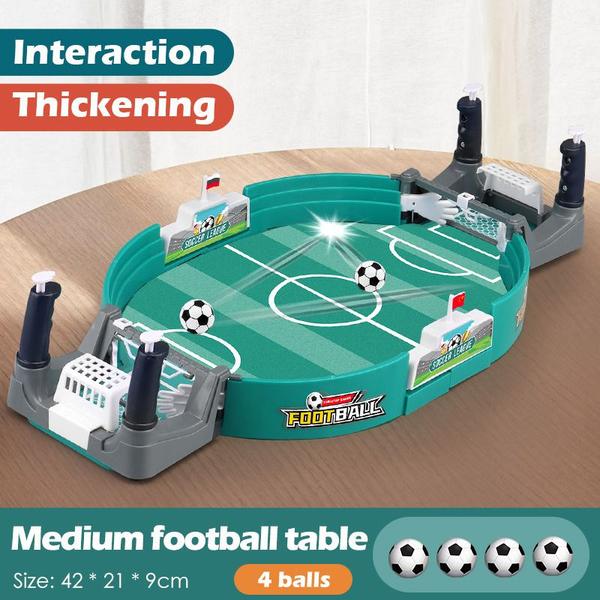 Imagem de Mesa de jogo de futebol de mesa As crianças jogam contra dois