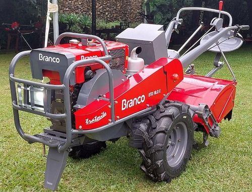 Microtrator Branco 18cv C/ Carreta Tracionada Fixa C/enxadas - Branco Motores Imagem de Microtrator Branco 18cv C/ Carreta Tracionada Fixa C/enxadas