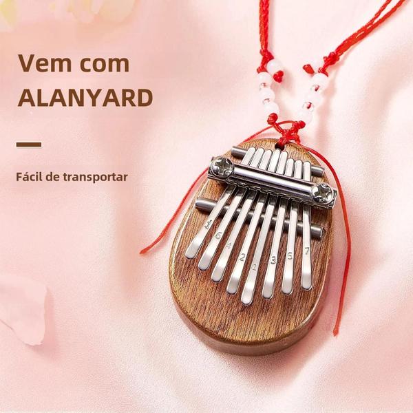 Imagem de Mini Kalimba 8 Teclas para Crianças - Estilo Gota d'Água - Portátil e Bonito