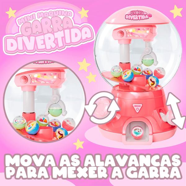 Imagem de Mini Máquina Garra Brinquedo Infantil Divertido Educativo Cor Rosa Com Sons E Luzes - Dm Toys