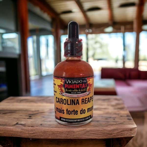 Molho De Pimenta Carolina Reaper Com Azeite 60 Ml - VICIADO EM PIMENTAS Imagem de Molho De Pimenta Carolina Reaper Com Azeite 60 Ml