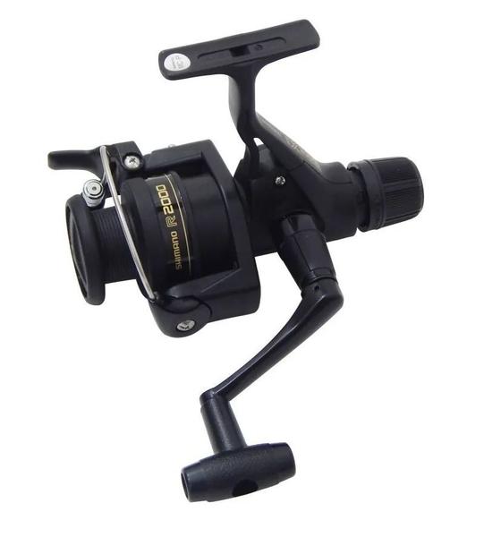 Imagem de Molinete de pesca Shimano Ix 2000r - Drag: 3kg - Arremesso Com Uma Unica Mao