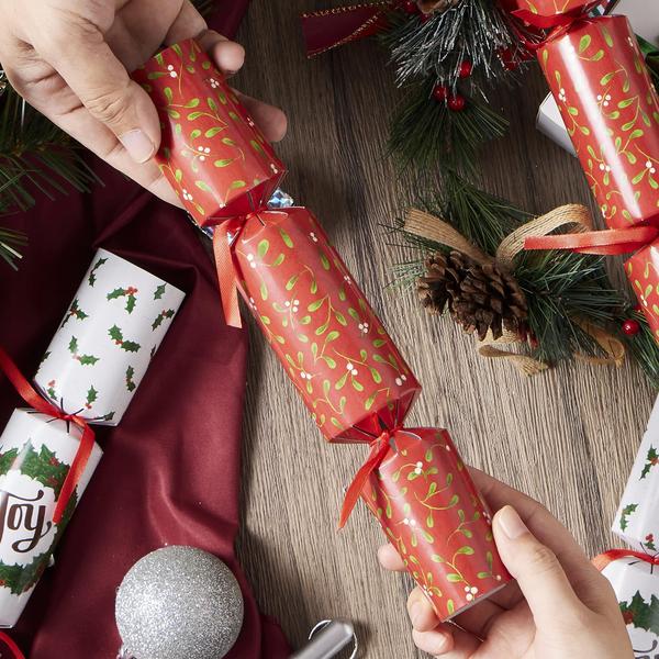 Imagem de Pacote de 10 mesas de Natal Favor JOYIN com chapéu, piada e presente no interior