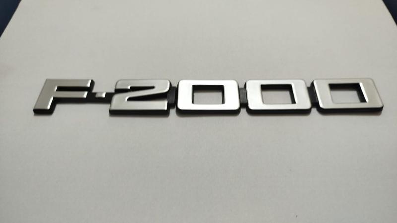 Imagem de Par Emblema Paralama F2000 Modelo Original