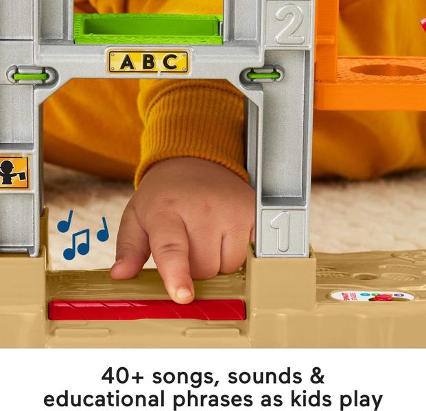 Pessoas pequenas de fisher-price carregam 'n aprender canteiro de obras, playset musical com caminhão de lixo para crianças e crianças pré-escolares de 1 1/2 a 5 anos Imagem de Pessoas pequenas de fisher-price carregam 'n aprender canteiro de obras, playset musical com caminhão de lixo para crianças e crianças pré-escolares de 1 1/2 a 5 anos