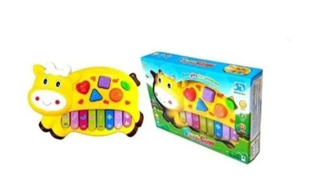 Imagem de Pianinho Bebe Brinquedo Infantil Educativo Musical Baby - Vaquinha(Amarelo)