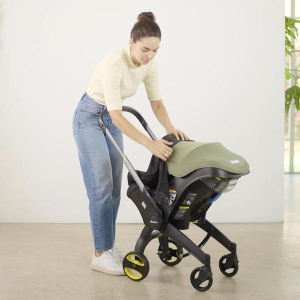 Proteção Doona 360 - Fixação do assento do carro para proteção solar, eólica e bug, feita para assentos de carro Doona Imagem de Proteção Doona 360 - Fixação do assento do carro para proteção solar, eólica e bug, feita para assentos de carro Doona