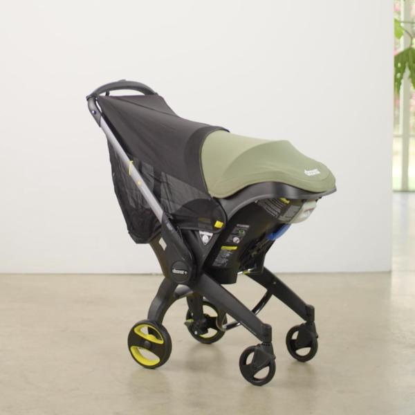 Proteção Doona 360 - Fixação do assento do carro para proteção solar, eólica e bug, feita para assentos de carro Doona Imagem de Proteção Doona 360 - Fixação do assento do carro para proteção solar, eólica e bug, feita para assentos de carro Doona