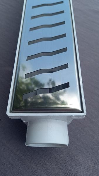 Ralo Linear 6x50 modelo Grelha Inox Polida Desenho S Coletor Branco - Ficone Reis Imagem de Ralo Linear 6x50 modelo Grelha Inox Polida Desenho S Coletor Branco - Ficone Reis