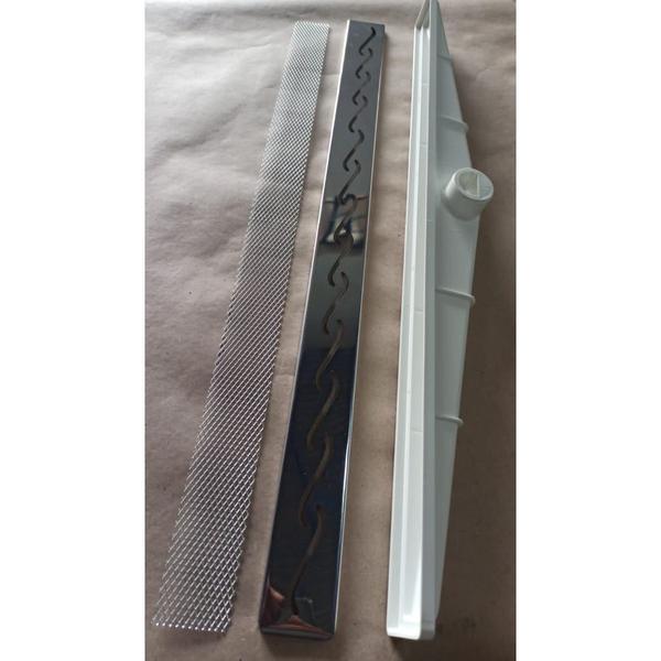 Ralo para Box de Banheiro Sifonado Não Volta Cheiro - Grelha Inox Polida Ondas Ficone Decor - Ficone Reis Imagem de Ralo para Box de Banheiro Sifonado Não Volta Cheiro - Grelha Inox Polida Ondas Ficone Decor