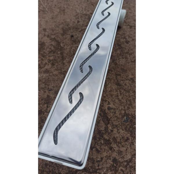 Ralo para Box de Banheiro Sifonado Não Volta Cheiro - Grelha Inox Polida Ondas Ficone Decor - Ficone Reis Imagem de Ralo para Box de Banheiro Sifonado Não Volta Cheiro - Grelha Inox Polida Ondas Ficone Decor
