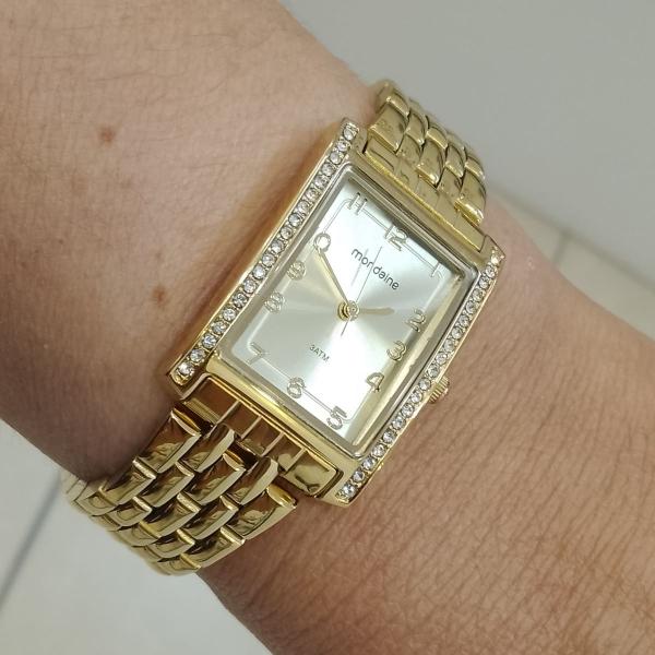 Imagem de Relogio Mondaine Feminino dourado quadrado retangular strass numero 32781LPMVDE1