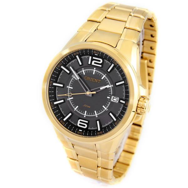 Imagem de Relogio orient masculino dourado fundo preto mgss1141 g2kx