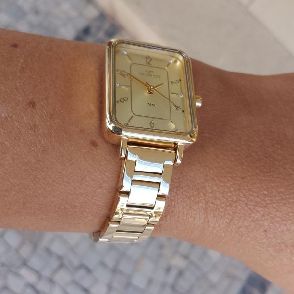 Imagem de Relogio Technos feminino dourado pequeno mini quadrado social aço inox GL32AM/1X