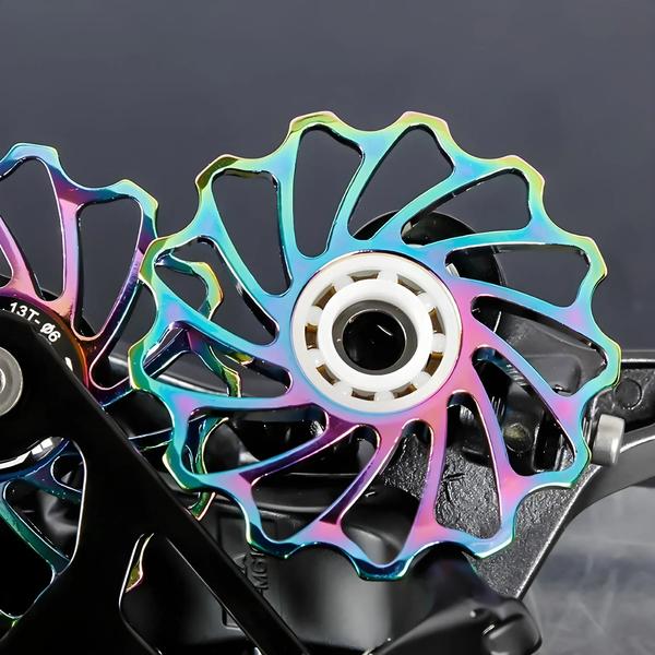 Rolamento Cerâmico MTB e Estrada - Roda Jockey Desviador Traseiro 11T/13T (Al7075 CNC) Imagem de Rolamento Cerâmico MTB e Estrada - Roda Jockey Desviador Traseiro 11T/13T (Al7075 CNC)