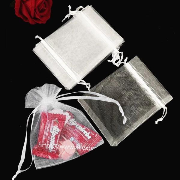 Saquinho De Organza 10x13 Fita Cetim Lembrancinha ( 100 Und ) - ART E FESTA Imagem de Saquinho De Organza 10x13 Fita Cetim Lembrancinha ( 100 Und )