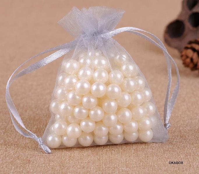 Saquinho De Organza 10x13 Fita Cetim Lembrancinha ( 100 Und ) - ART E FESTA Imagem de Saquinho De Organza 10x13 Fita Cetim Lembrancinha ( 100 Und )