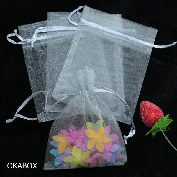 Saquinho de organza com fita cetim 7x9 - 50 unidades - Art e festa Imagem de Saquinho de organza com fita cetim 7x9 - 50 unidades