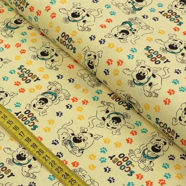 Imagem de Tecido Estampado para Patchwork - Warner Bros: Scooby Doo Baby Patinhas Fundo Amarelo Claro (0,50x1,40)