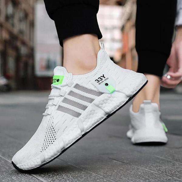 Tênis de Corrida Leve e Confortável para Homens e Mulheres - Design Respirável Imagem de Tênis de Corrida Leve e Confortável para Homens e Mulheres - Design Respirável