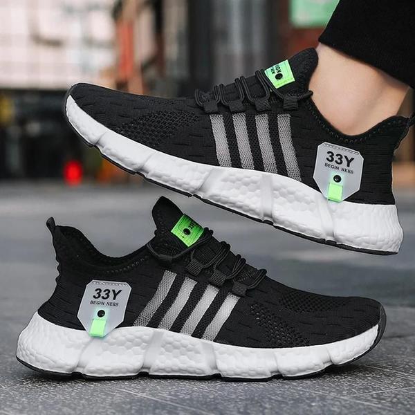 Tênis de Corrida Leve e Confortável para Homens e Mulheres - Design Respirável Imagem de Tênis de Corrida Leve e Confortável para Homens e Mulheres - Design Respirável