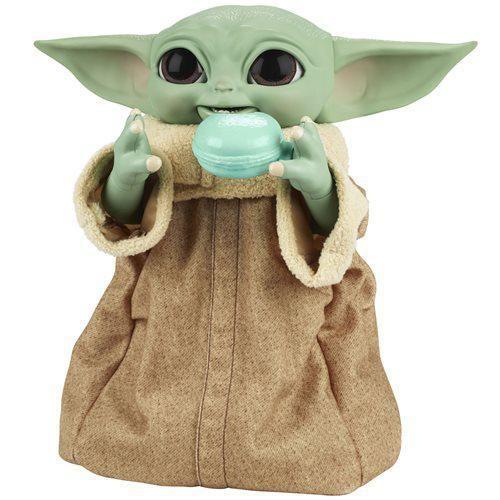 Imagem de The Child Grogu Baby Yoda Galactic Snackin' Boneco