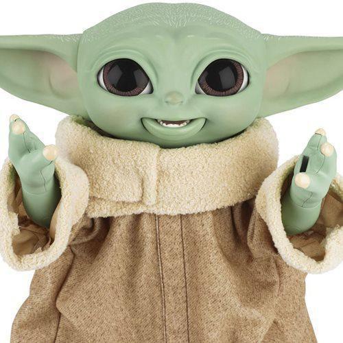 Imagem de The Child Grogu Baby Yoda Galactic Snackin' Boneco