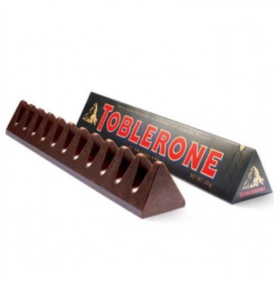 Toblerone chocolate amargo dark exclusivo - 100g Imagem de Toblerone chocolate amargo dark exclusivo - 100g