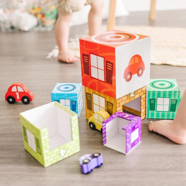 Imagem de Toy Melissa e Doug aninhando e classificando garagens e carros