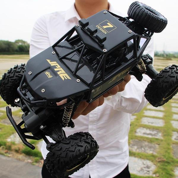 Imagem de Veículo off-road RC Car Wokex 4WD 2,4 GHz subindo em escala 1:12