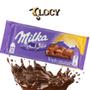 Imagem de 3 barras de chocolate milka de caramelo tripla textura 100g