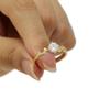 Imagem de Anel Solitário com Zircônia Transparente e Aro com Curvas Folheado em Ouro 18K