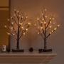 Imagem de Árvore de Natal Iluminada com Neve Artificial - 45cm, 24 LEDs e Temporizador