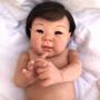 Imagem de Bebê  Reborn Japonesa Silicone Realista Com Enxoval Completo