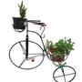 Imagem de bicicleta para jardim com suporte para flores em ferro e madeira