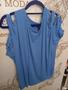 Imagem de Blusa em malha viscose azul celeste