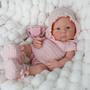 Imagem de Boneca Bebê Reborn Realista Silicone Sólido 35cm Com Kit Conjunto de Roupa Chupeta Mamadeira e Pelúcia Pode Tomar Banho