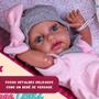 Imagem de Boneca Boutique Dolls Reborn Com Macacão Rosa E Acessórios