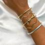 Imagem de Bracelete festa aro liso e cravejado detalhe torcido banhado a ouro 18k