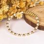 Imagem de Bracelete flexível Sabrina com bolinhas e perólas banhado em ouro 18k